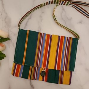 Handcrafted bag, purse, strap, button closure and large roomy interior. Stripes.